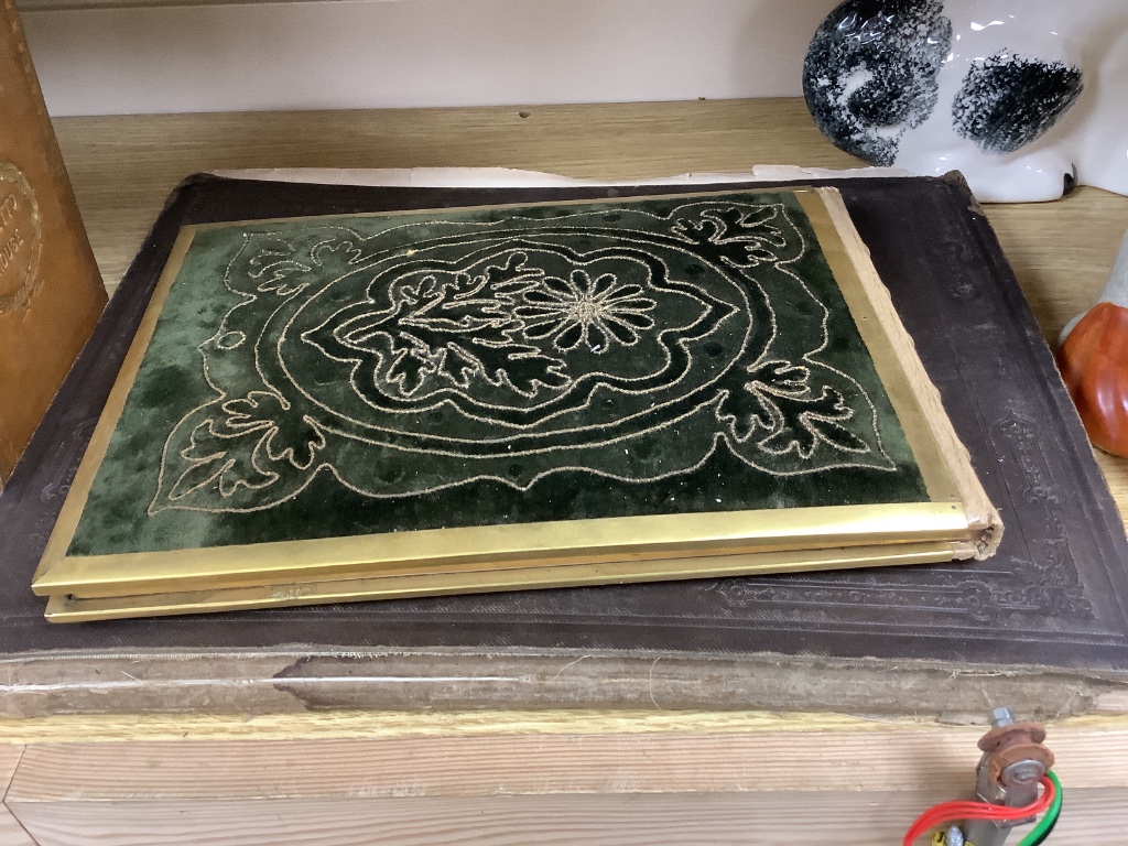 A collection of mixed 19th and 20th century leather bound books